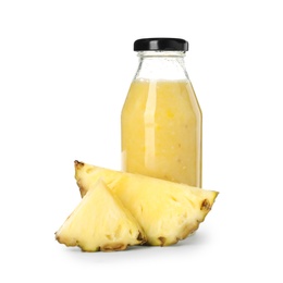 Photo of Bottle of delicious juice and fresh pineapple on white background