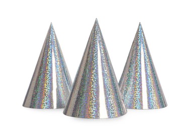 Photo of Bright birthday party hats on white background