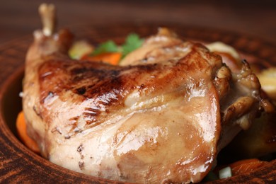 Photo of Tasty cooked rabbit meat in bowl, closeup