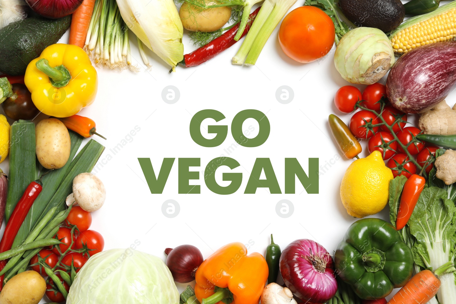 Image of Phrase Go Vegan and fresh vegetables on white background, flat lay