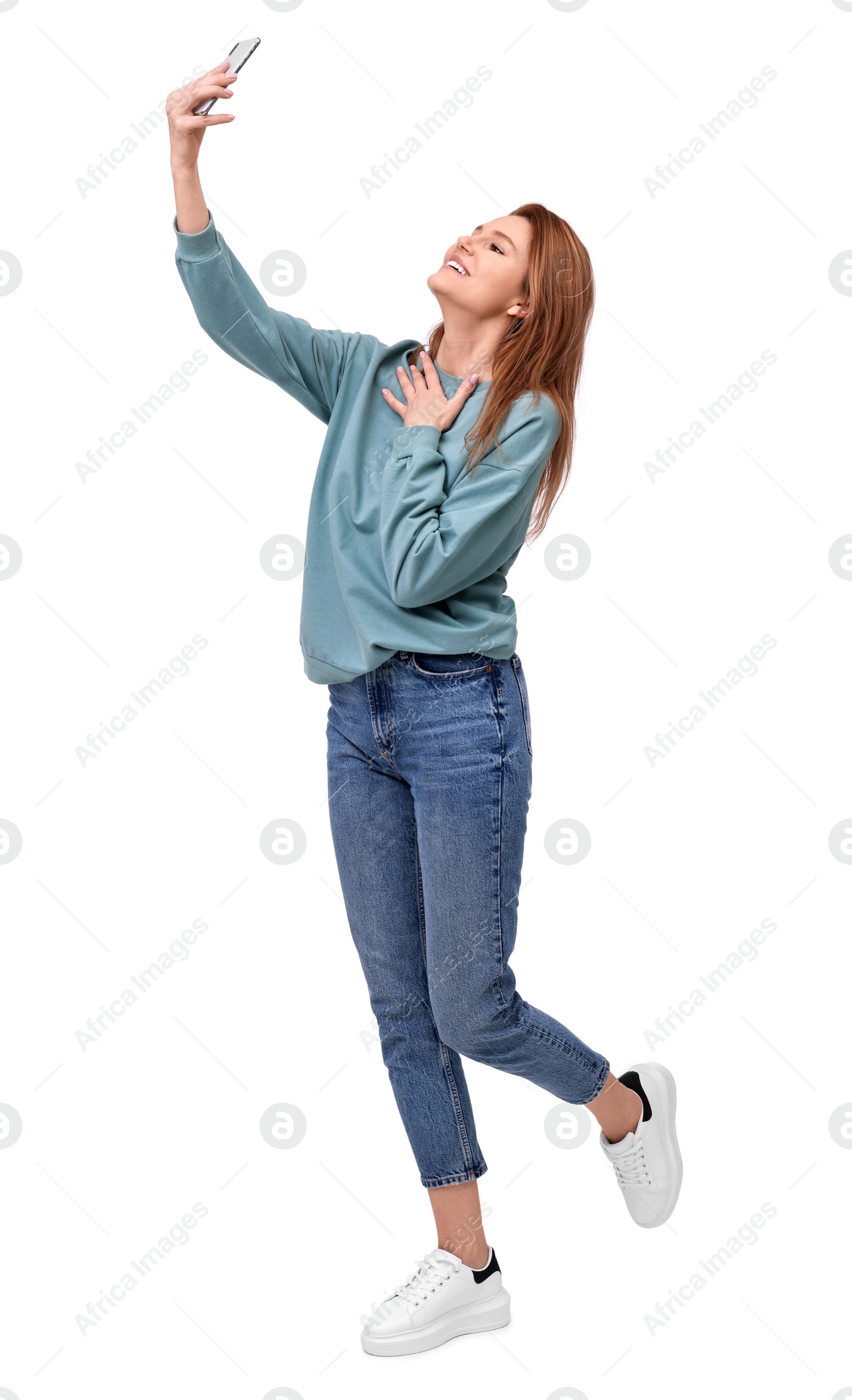 Photo of Beautiful woman taking selfie on white background