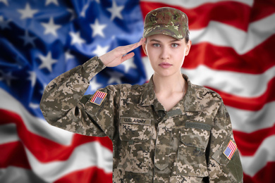 Image of Female soldier and American flag on background. Military service