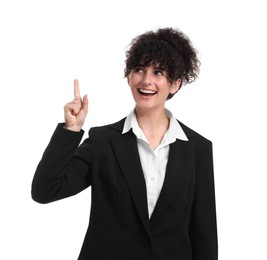 Photo of Beautiful happy businesswoman pointing at something on white background