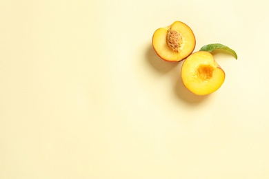 Photo of Flat lay composition with ripe peach on color background