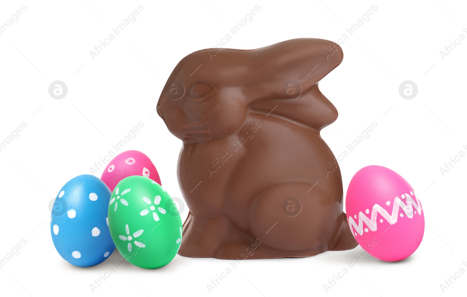 Image of Chocolate bunny and painted Easter eggs on white background