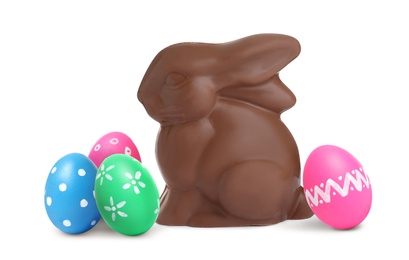 Image of Chocolate bunny and painted Easter eggs on white background