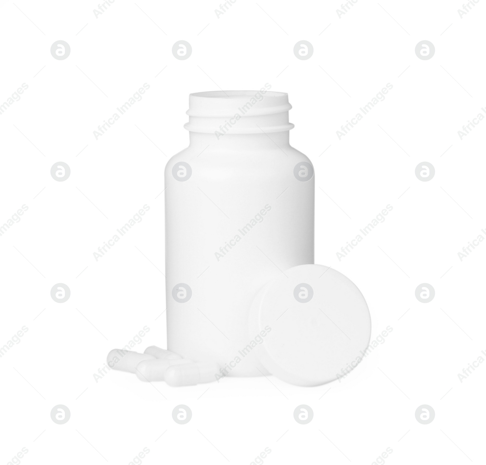 Photo of Blank jar and vitamin capsules isolated on white