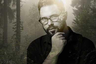 Double exposure of thoughtful man and trees