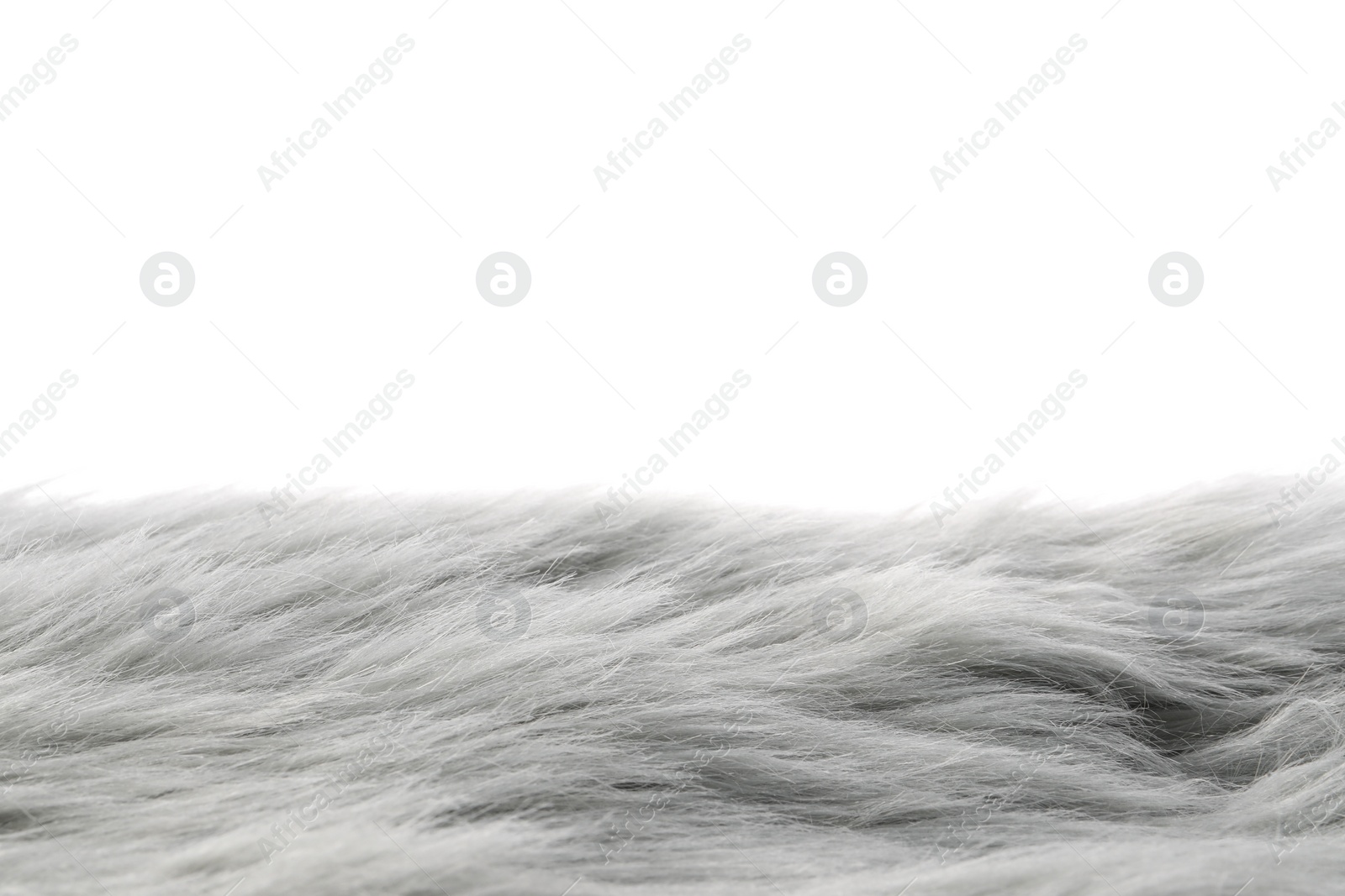 Photo of Soft grey faux fur isolated on white