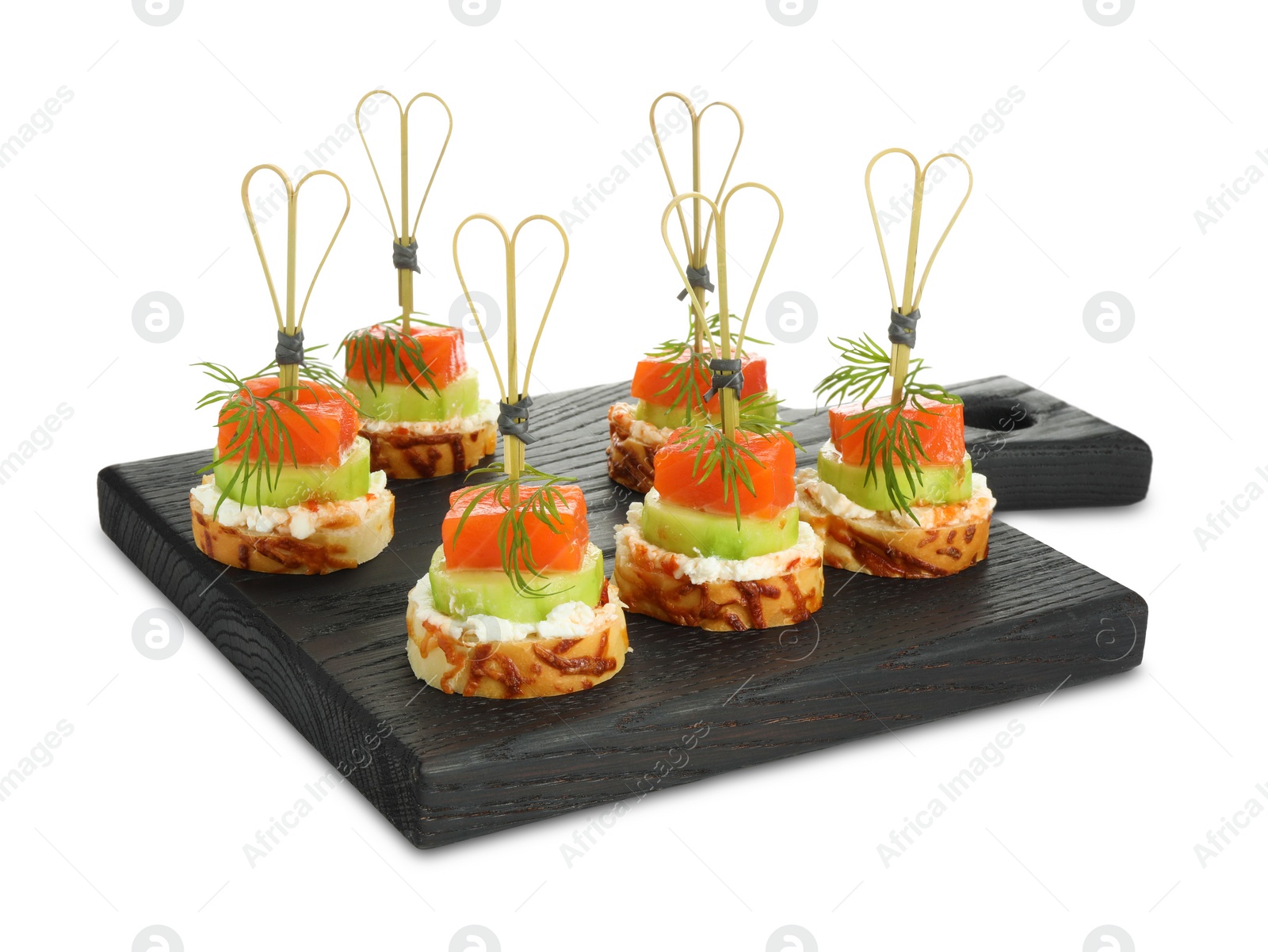 Photo of Tasty canapes with salmon, cucumber, bread and cream cheese isolated on white