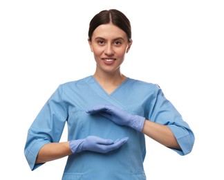 Photo of Doctor in scrubs holding something on white background