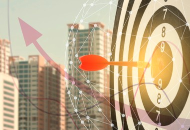 Image of Darts hitting target on board, graph illustration and blurred of view cityscape