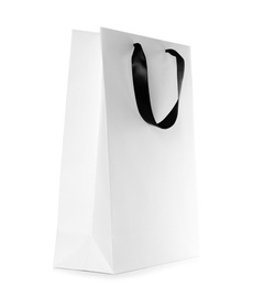 Photo of Paper shopping bag isolated on white. Mock up for design