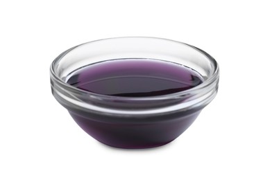 Photo of Glass bowl with purple food coloring isolated on white