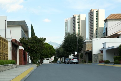 Picturesque view of car road and beautiful city architecture