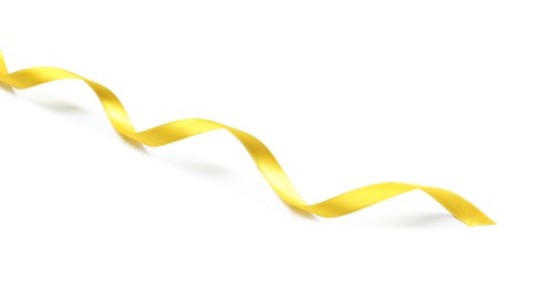 Photo of One golden satin ribbon on white background, above view