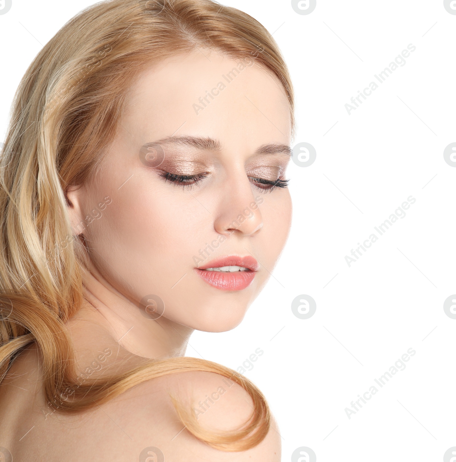 Photo of Portrait of beautiful woman with long blonde hair on white background