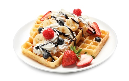 Photo of Plate with yummy waffles, whipped cream and berries on white background