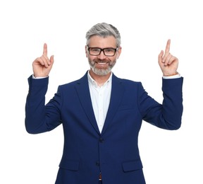 Mature businessman in stylish clothes posing on white background