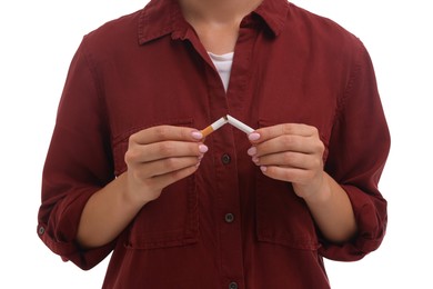 Photo of Stop smoking concept. Woman breaking cigarette on white background, closeup