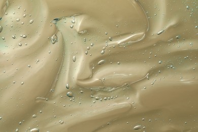 Photo of Transparent cleansing gel as background, closeup. Cosmetic product
