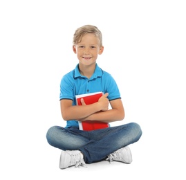 Photo of Little child with school supplies on white background