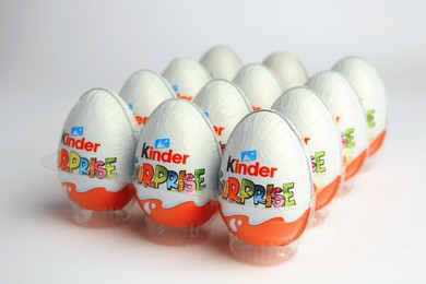 Sveti Vlas, Bulgaria - June 26, 2023: Kinder Surprise Eggs in plastic tray on white background