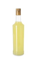Photo of Bottle of tasty limoncello liqueur isolated on white