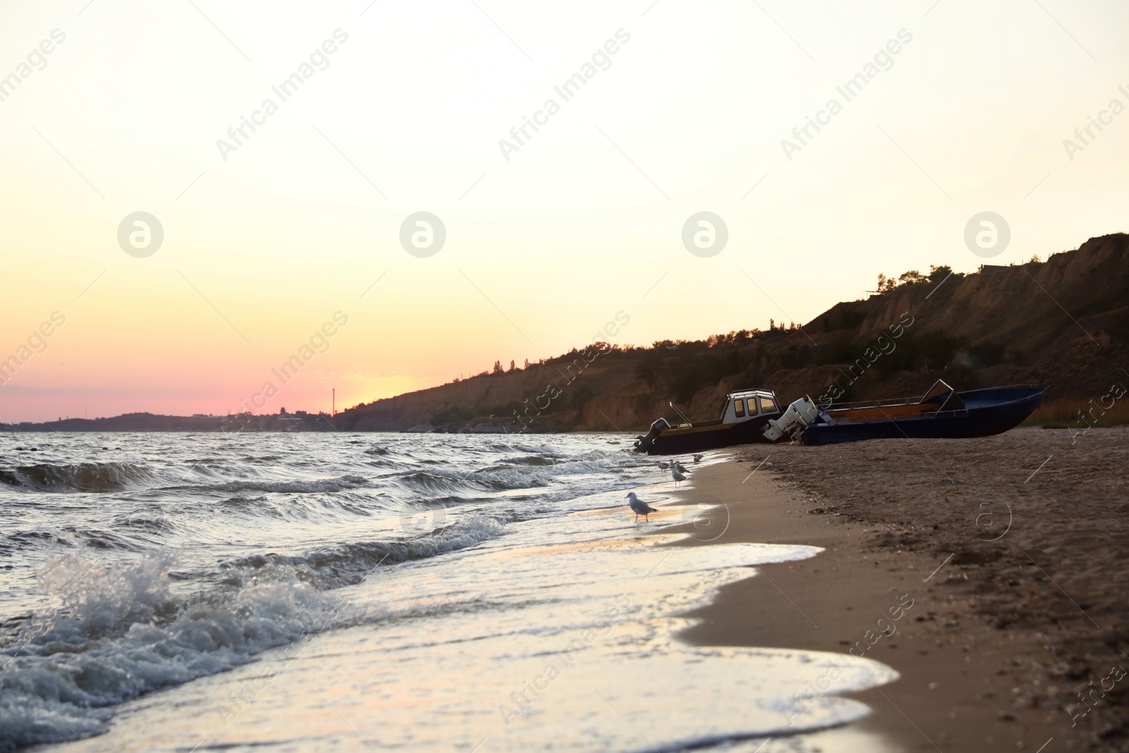 Photo of Beautiful view of sea coast at sunset