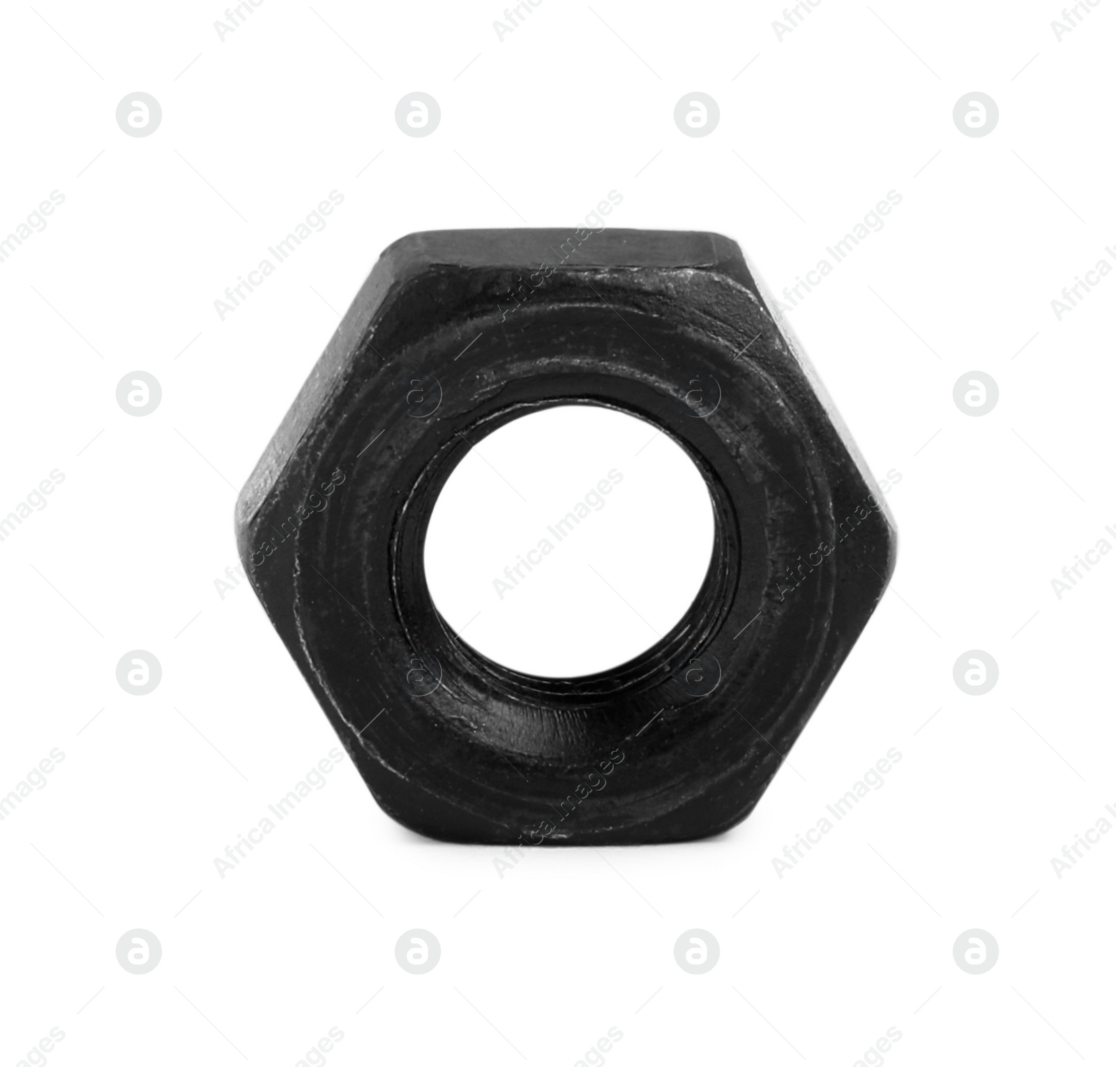 Photo of One black metal hex nut on white background