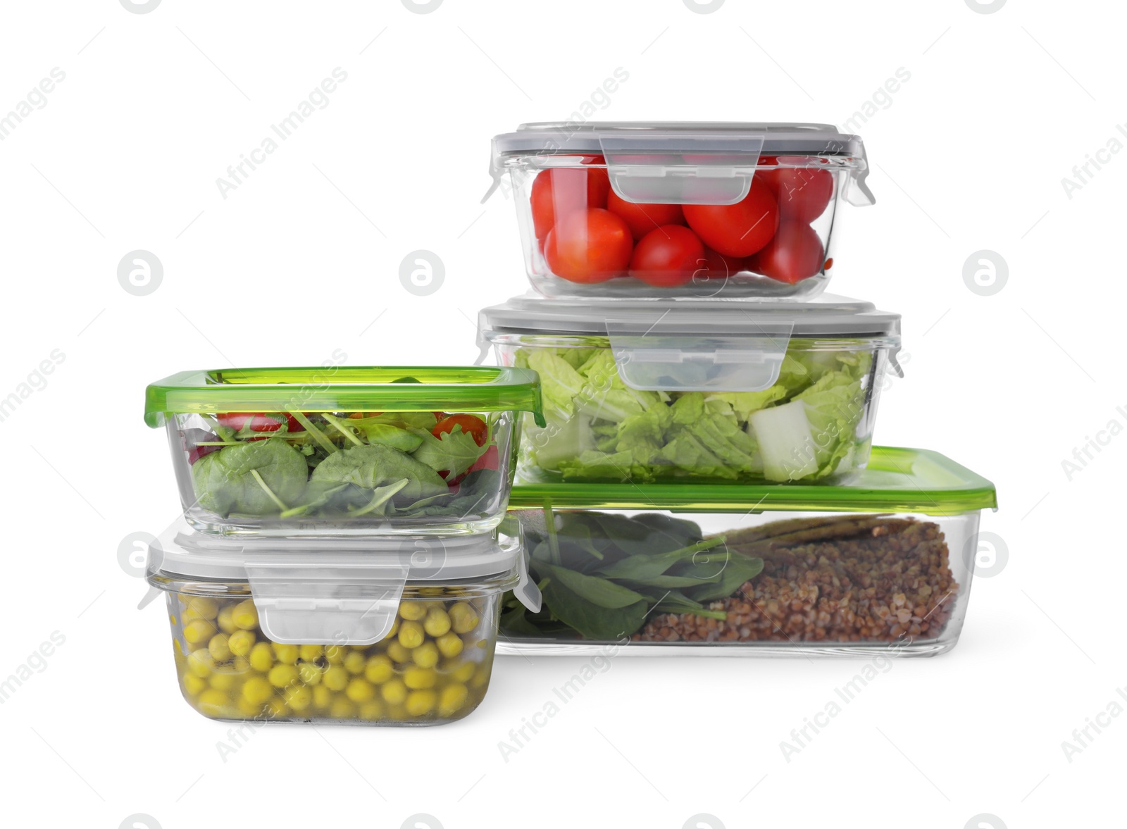 Photo of Glass containers with different fresh products isolated on white