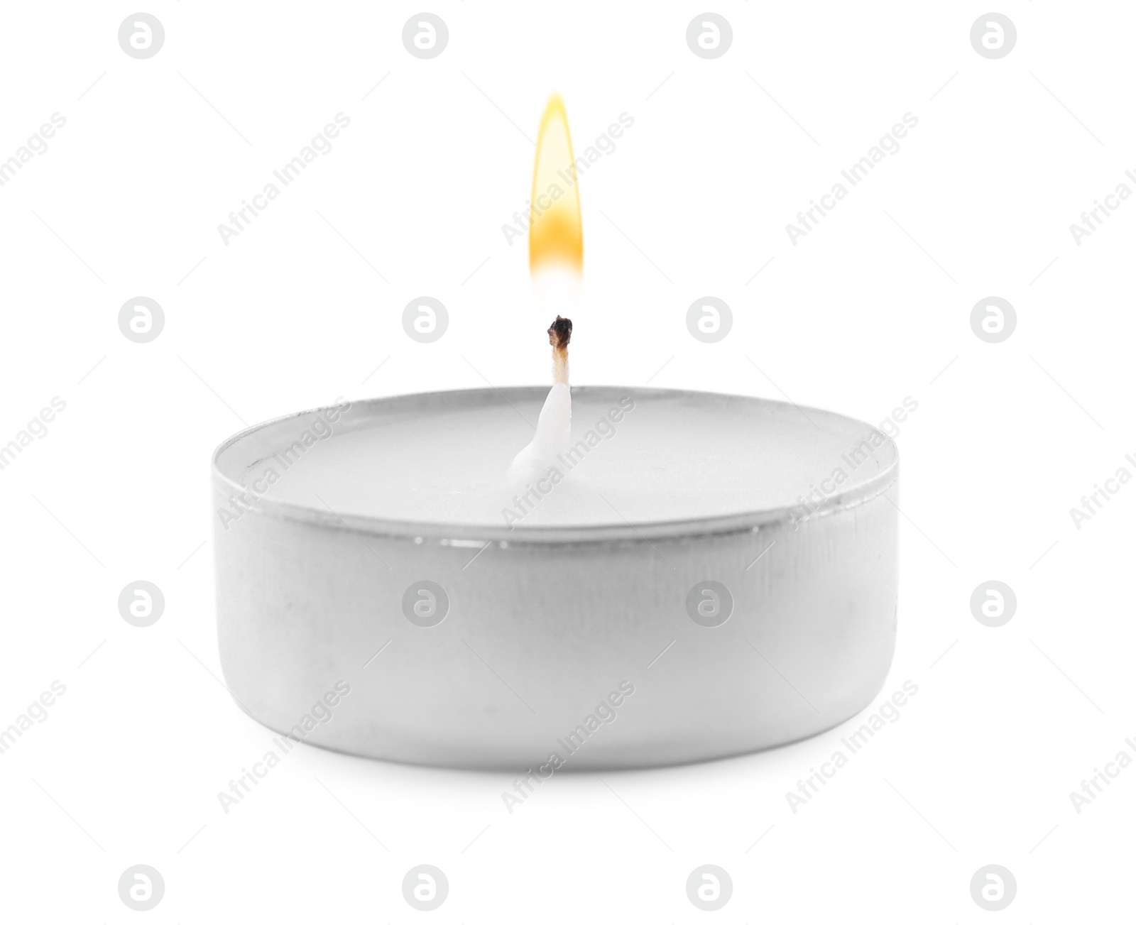 Photo of Small wax candle isolated on white. Beautiful decor