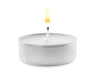 Photo of Small wax candle isolated on white. Beautiful decor