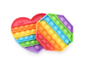 Photo of Rainbow pop it fidget toys on white background, top view