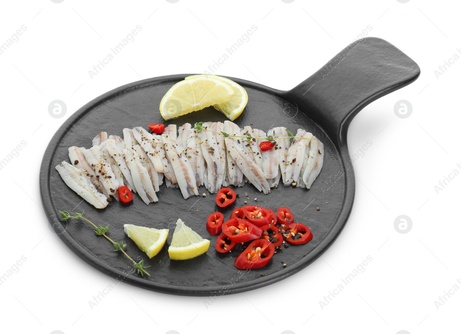 Photo of Tasty anchovies with spices and lemon slices isolated on white