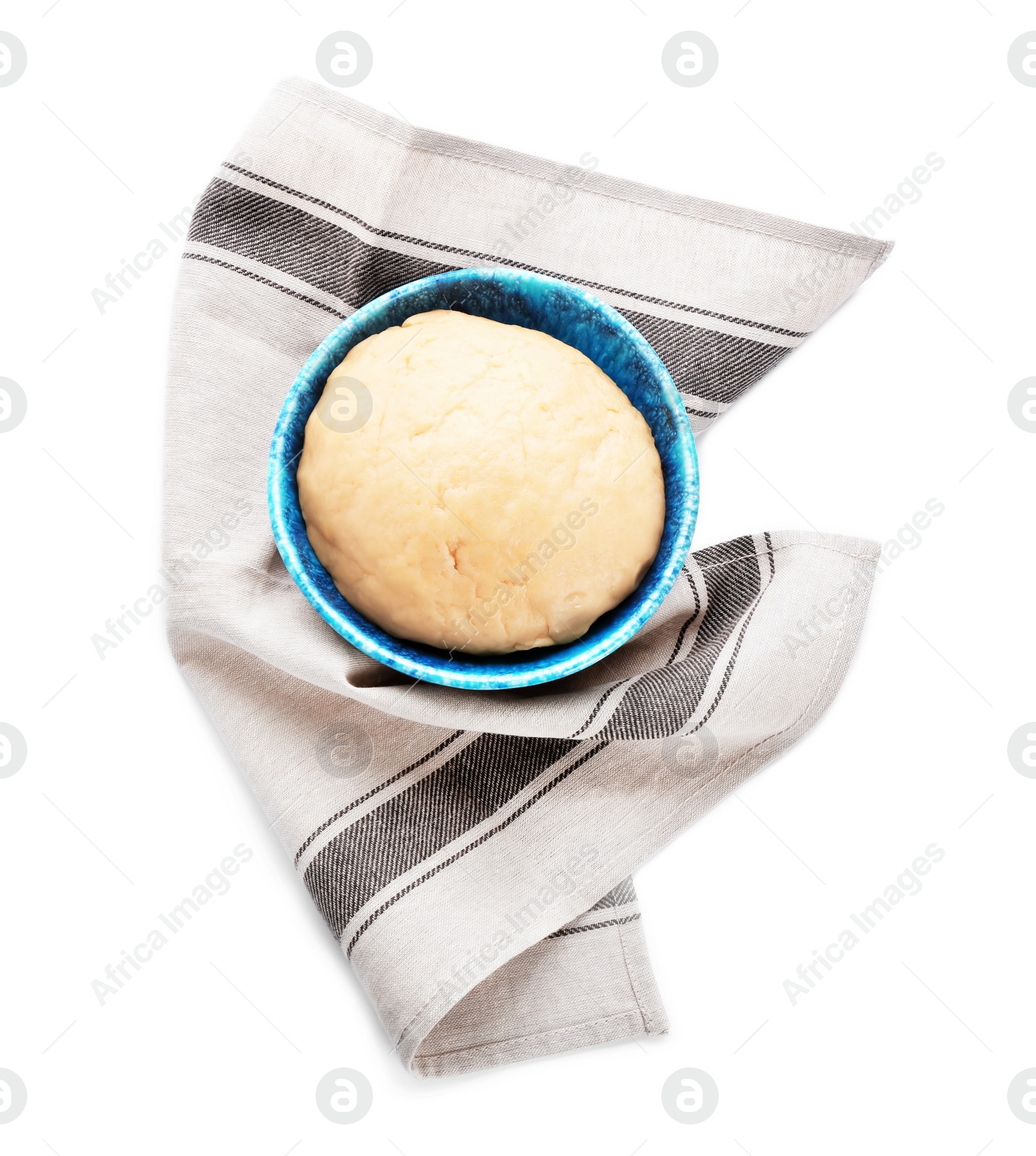 Photo of Bowl with raw dough on white background, top view