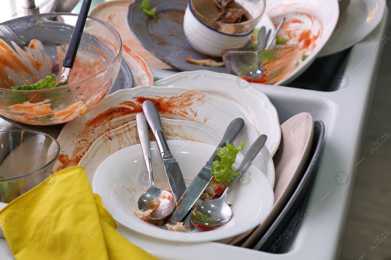 Photo of Dirty dishes in sink after new year party