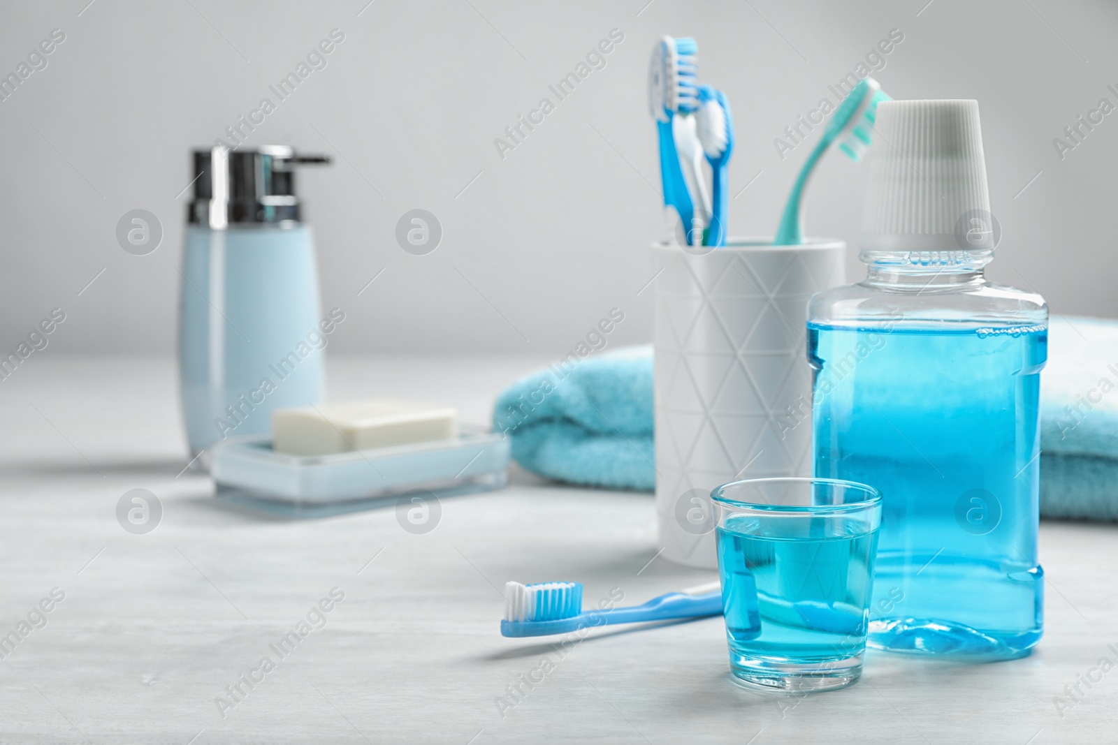 Photo of Set of oral care products on light table. Teeth hygiene