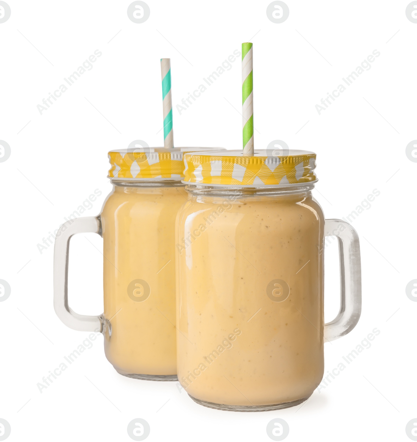 Photo of Tasty banana smoothie with straws on white background