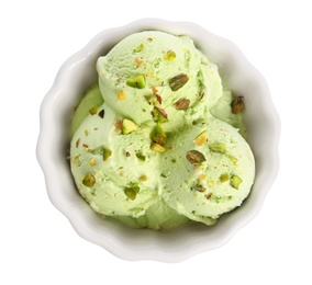 Photo of Bowl of sweet pistachio ice cream on white background, top view