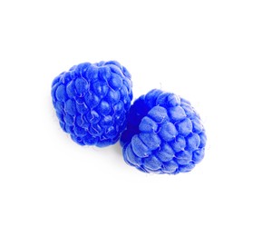 Fresh tasty blue raspberries isolated on white