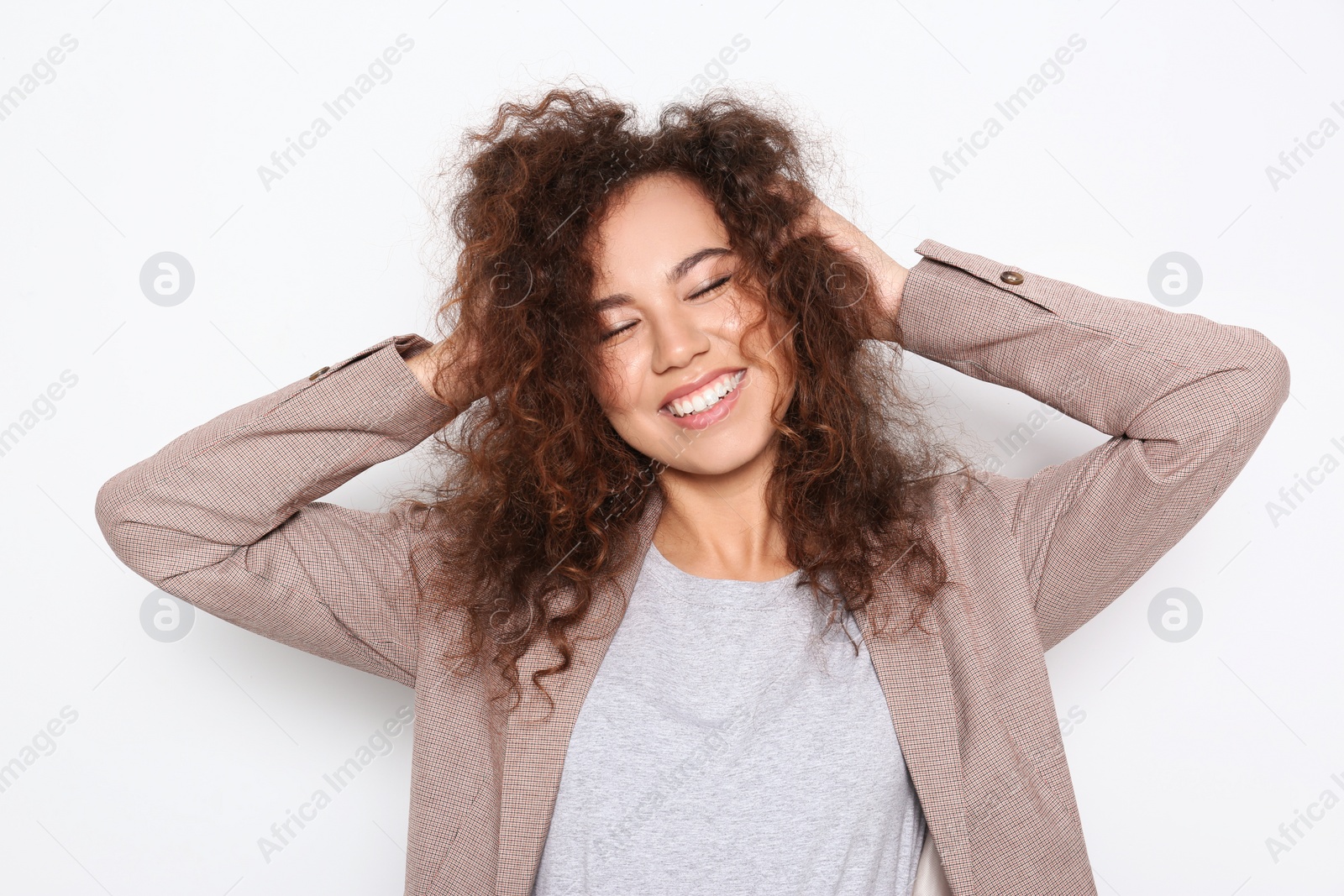 Photo of Young African-American woman with beautiful face on white background