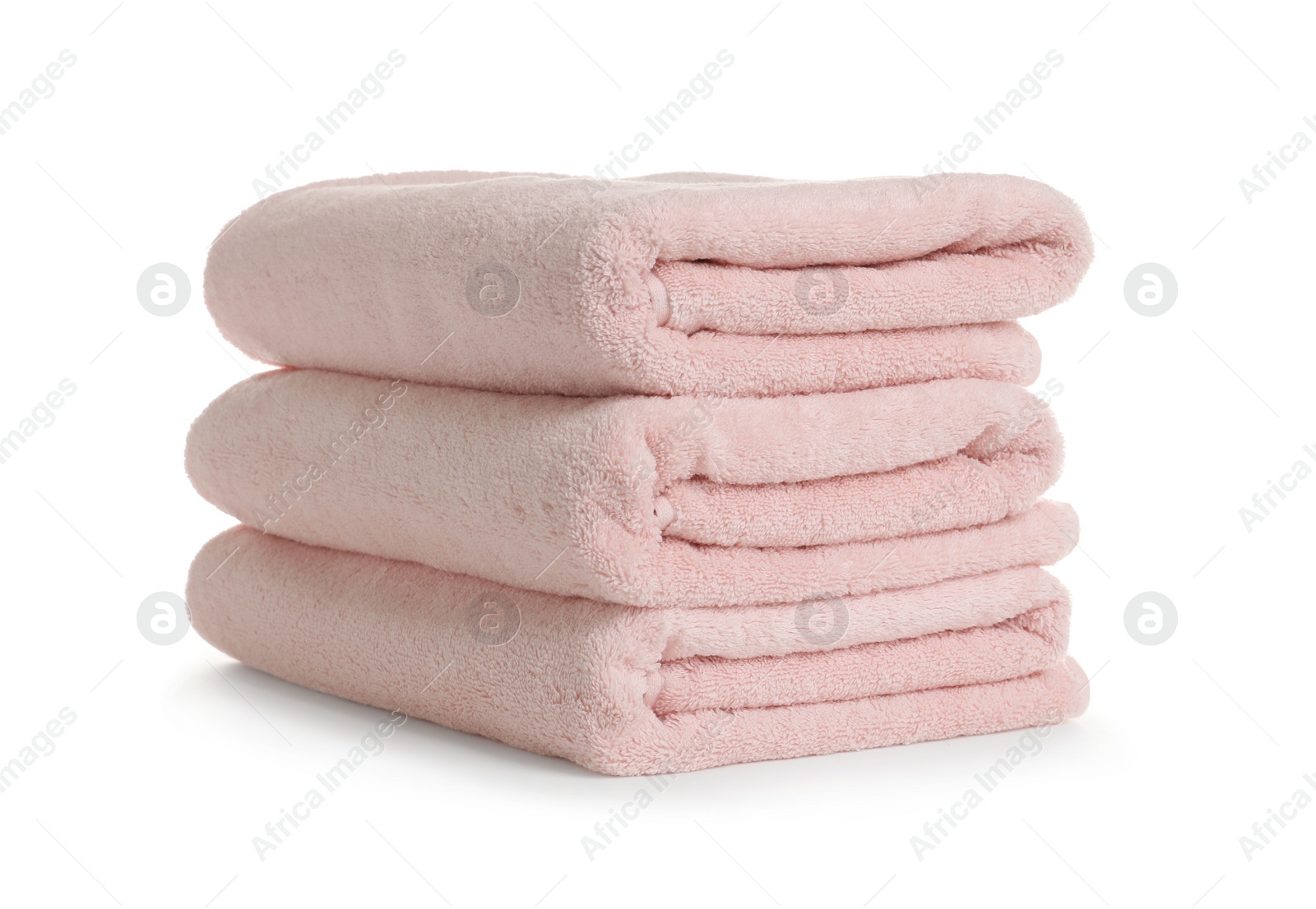 Photo of Stack of clean soft towels on white background