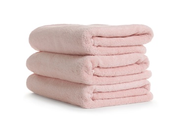 Stack of clean soft towels on white background