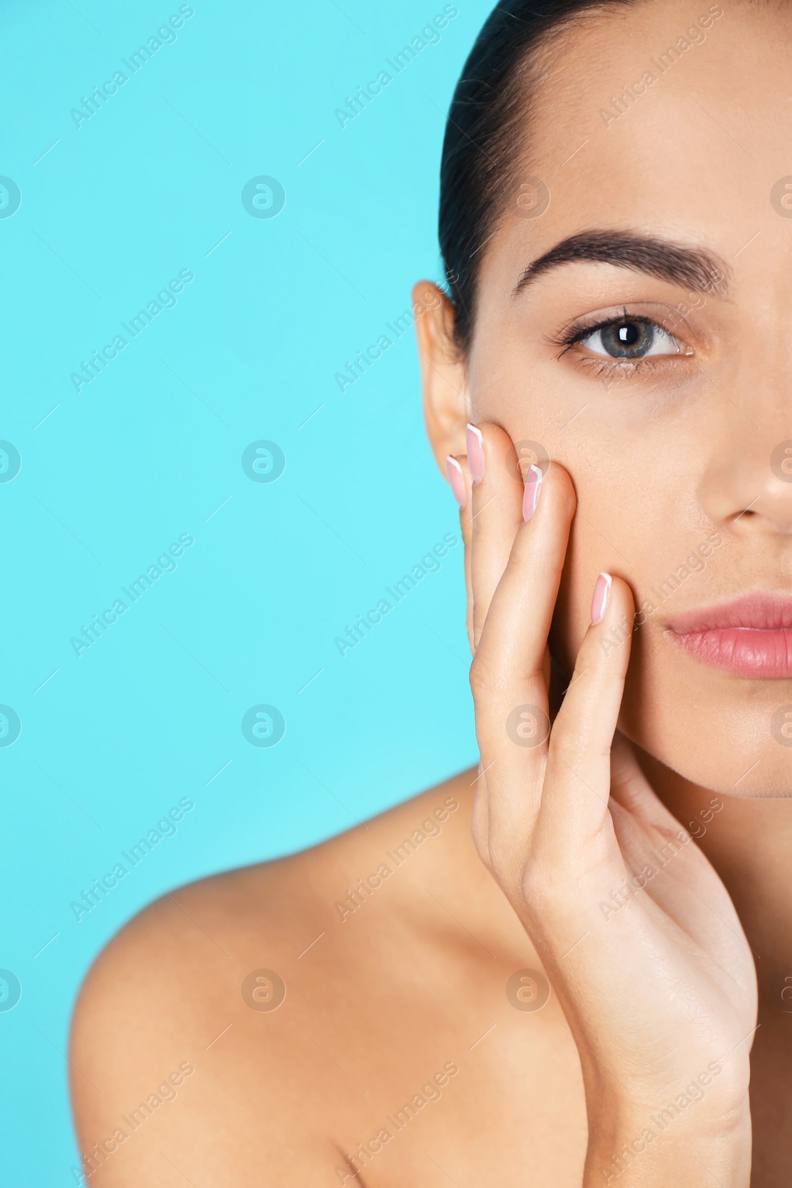 Photo of Portrait of beautiful young woman and space for text on color background. Cosmetic surgery concept