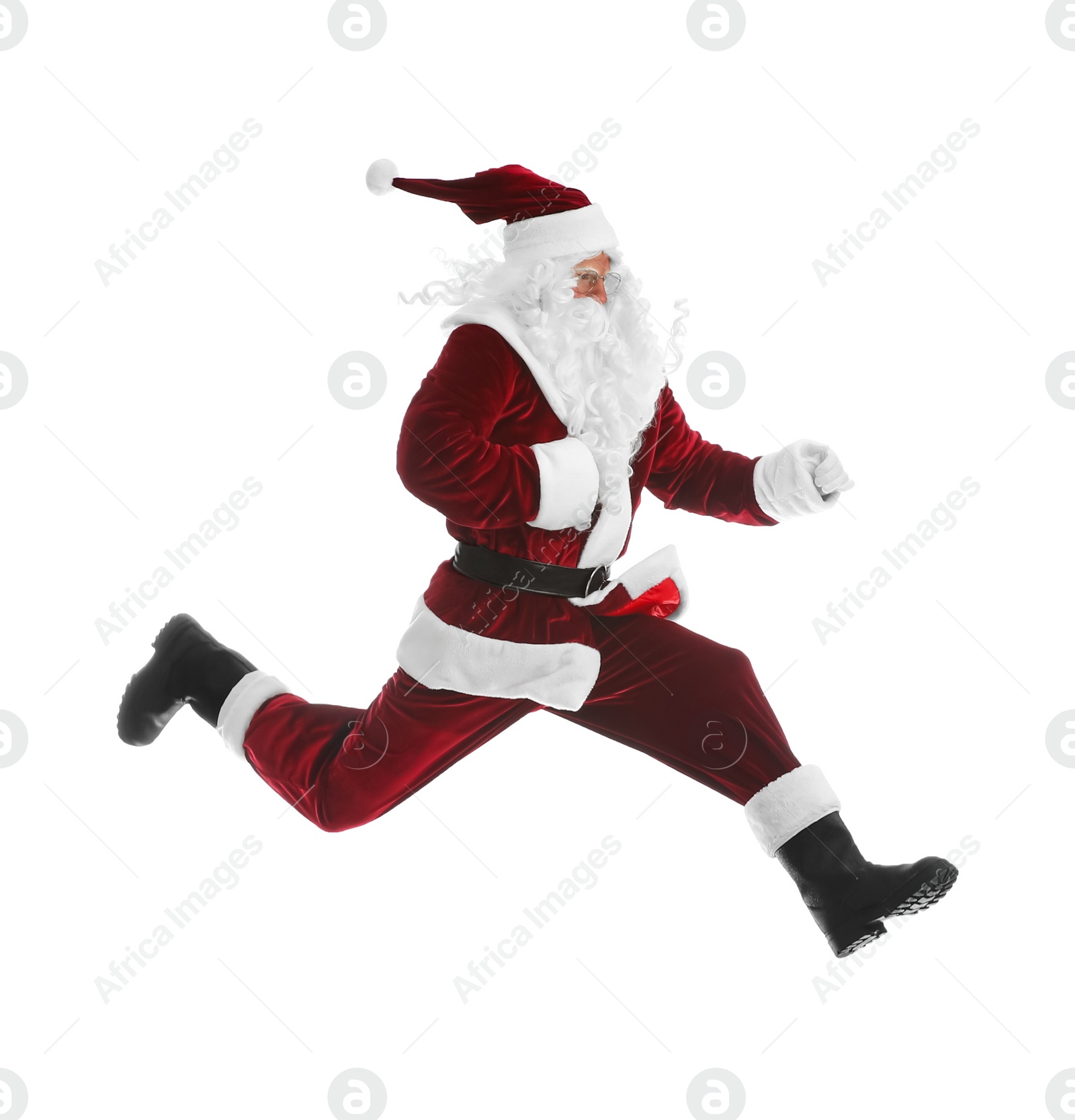 Photo of Santa Claus in red costume jumping on white background
