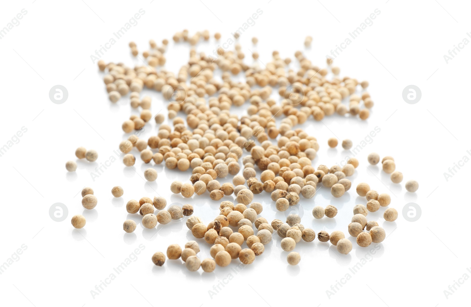 Photo of Pepper grains on white background. Natural spice