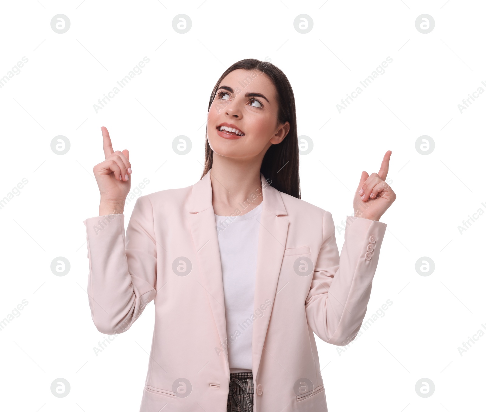 Photo of Beautiful businesswoman in suit pointing at something on white background