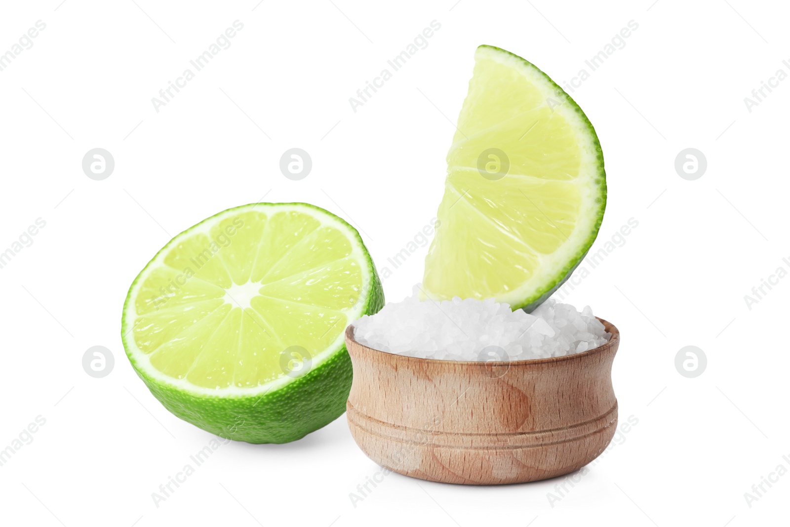 Image of Cut lime and salt isolated on white. Margarita cocktail ingredients