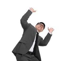 Scared businessman in suit posing on white background